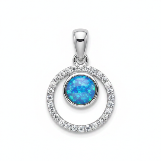 Silver 925 double circle CZ memorial pendant with blue opal flakes, white background