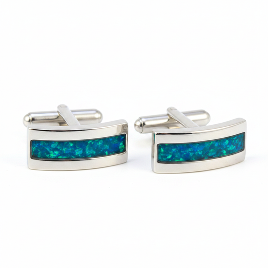 Silver 925 curved rectangular channel cufflinks with blue teal opal resin in 3x20mm channel on white background