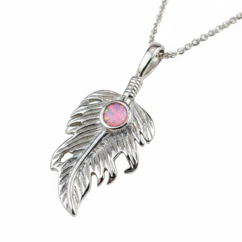 Silver 925 feather leaf memorial pendant with pink opal flakes, white background