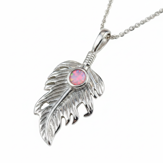 Silver 925 feather leaf memorial pendant with pink opal flakes, white background