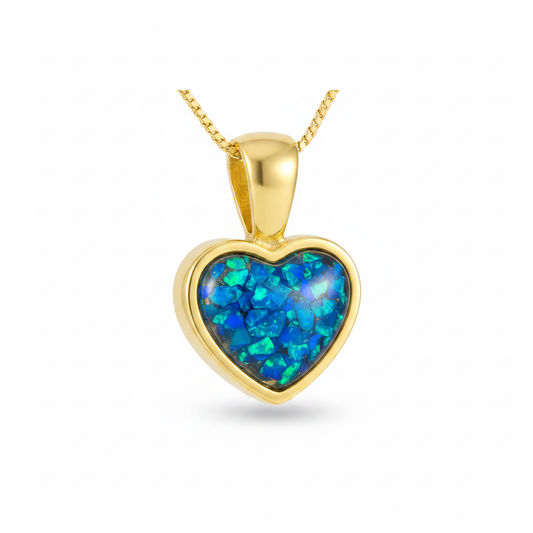 9ct gold heart memorial pendant with blue teal opal flakes inclusion on white background
