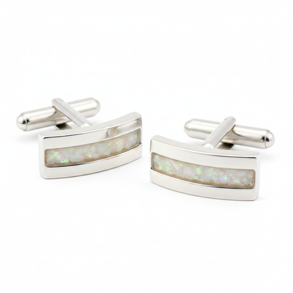 Silver 925 curved rectangular channel cufflinks with white pearl opal resin in 3x20mm channel on white background
