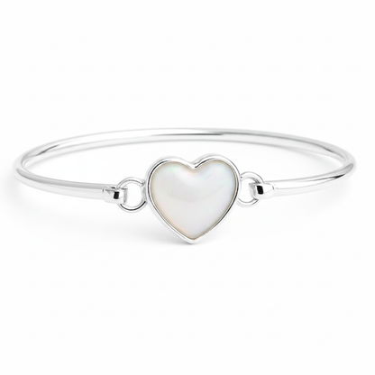 Heart hook clasp silver bangle with white pearl opal resin in heart bezel, white background