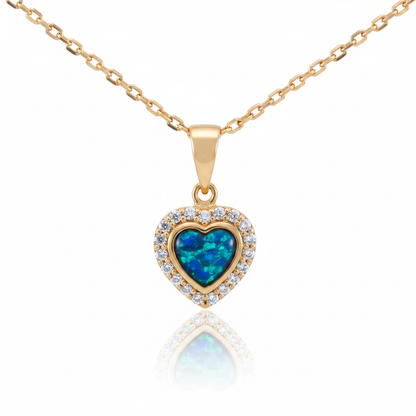 9ct gold heart pendant with blue teal opal inclusion