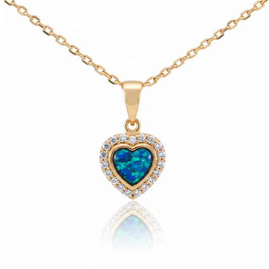 9ct gold heart pendant with blue teal opal inclusion