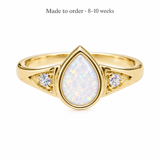 Illustrative 9ct gold CZ Teardrop memorial ring with pearl white opal resin inclusion