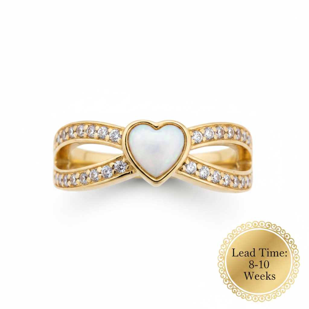 9ct gold heart split shank CZ ring with white pearl opal resin in heart bezel, white background, lead time 8-10 weeks sticker