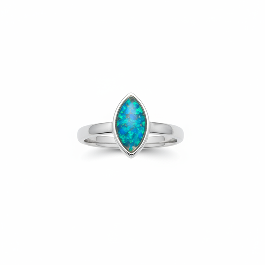 925 sterling silver plain marquise memorial ring with blue teal opal resin filling marquise bezel on white background