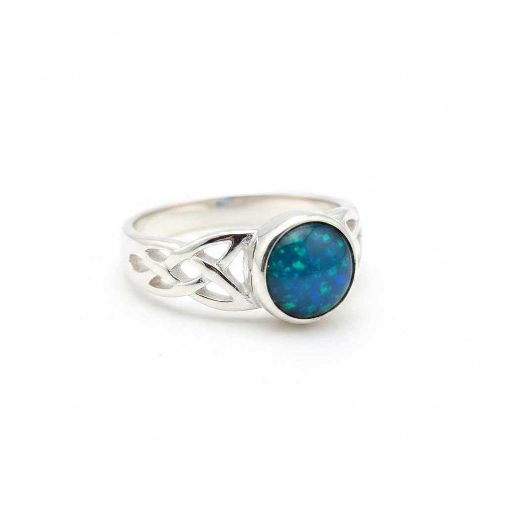 Silver 925 Celtic knotwork shoulder memorial ring — blue teal opal flakes resin in 6mm round setting, open Celtic knotwork shoulders