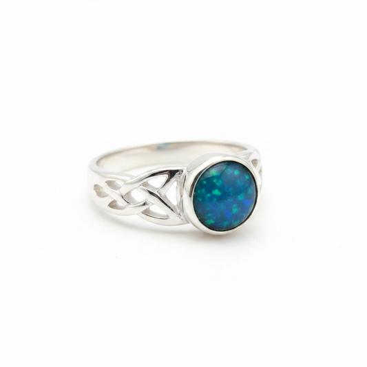 Silver 925 Celtic knotwork shoulder memorial ring — blue teal opal flakes resin in 6mm round setting, open Celtic knotwork shoulders