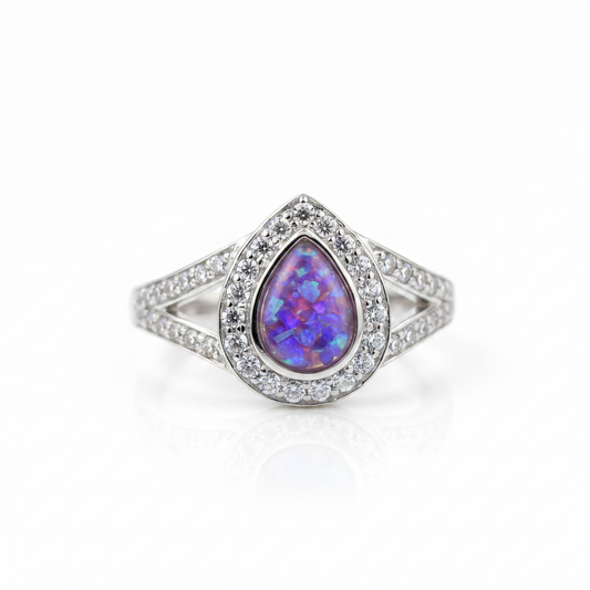 925 sterling silver split shank pear memorial ring with lavender purple opal flakes in pear bezel on white background