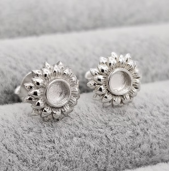 Silver 925 sunflower stud earrings close up on grey velvet — blank silver