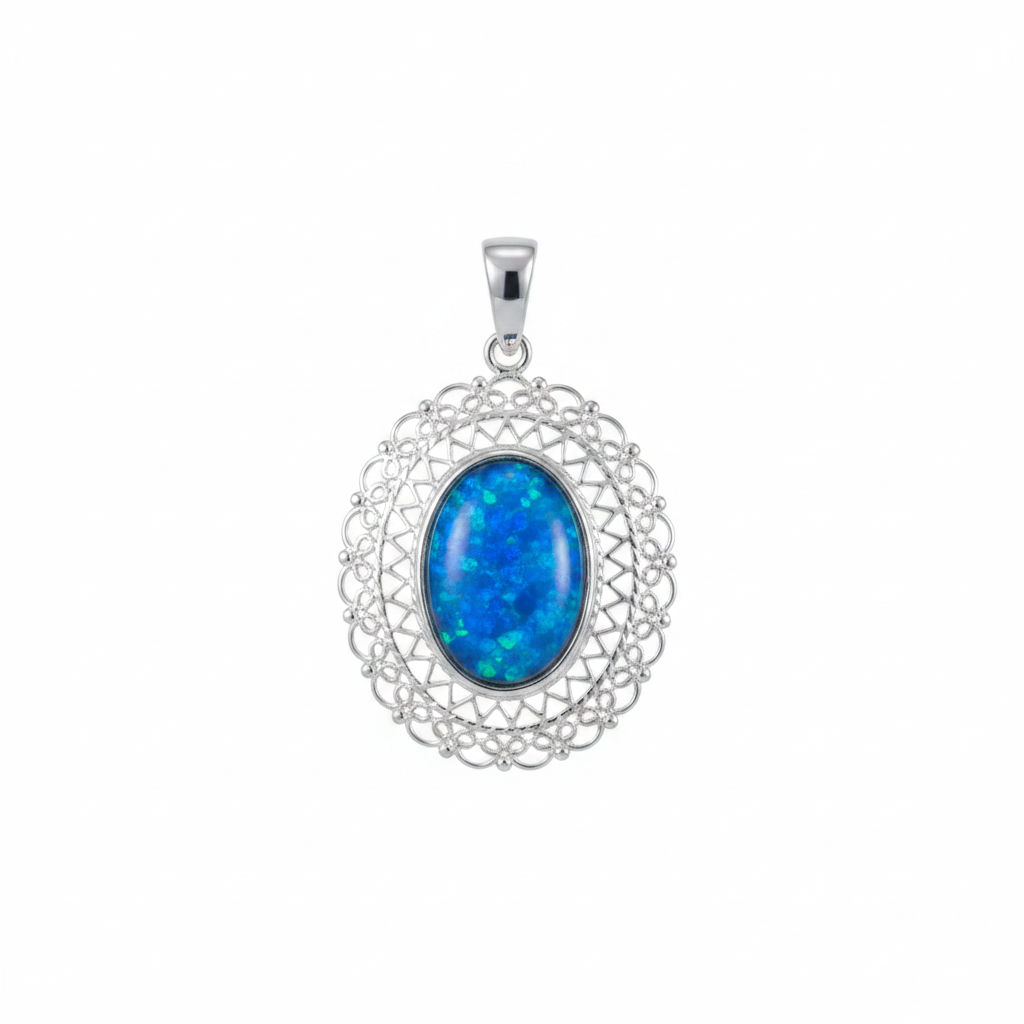 Silver 925 oval filigree memorial pendant with blue opal flakes, white background