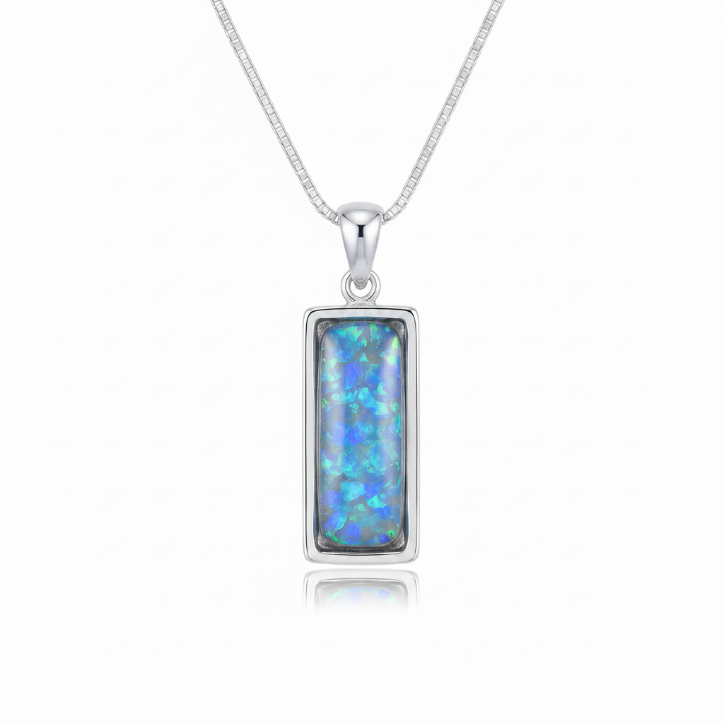 Silver 925 rectangular bar memorial pendant with blue opal resin on chain, white background