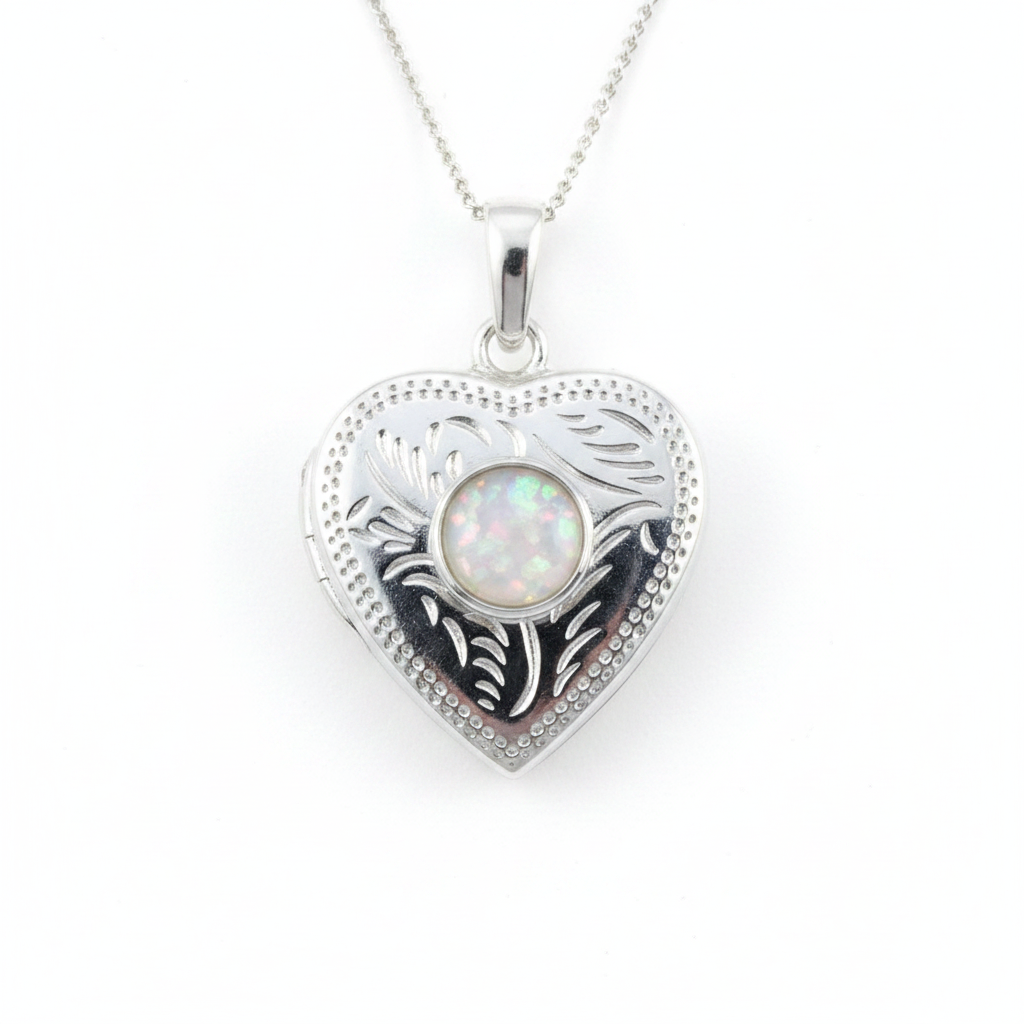 Silver 925 engraved heart locket with white pearl opal resin in 6mm centre setting on white background