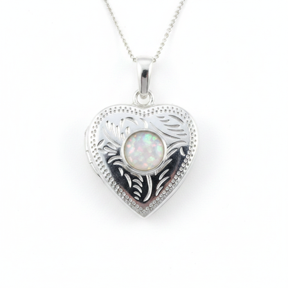 Silver 925 engraved heart locket with white pearl opal resin in 6mm centre setting on white background