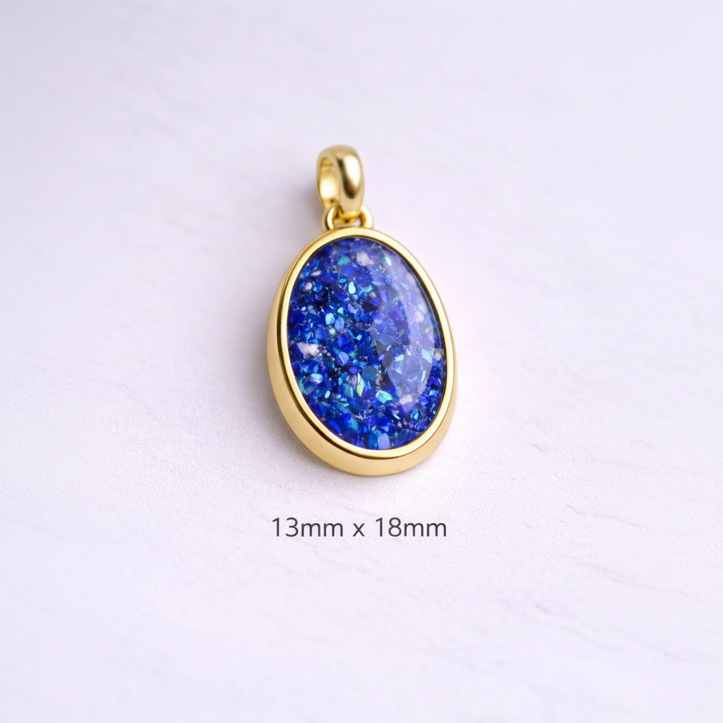Gold pendant with a blue stone on a light purple background