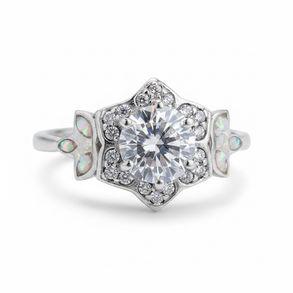 Vintage floral 925 silver CZ ring with white pearl opal resin in marquise butterfly wing settings on white background