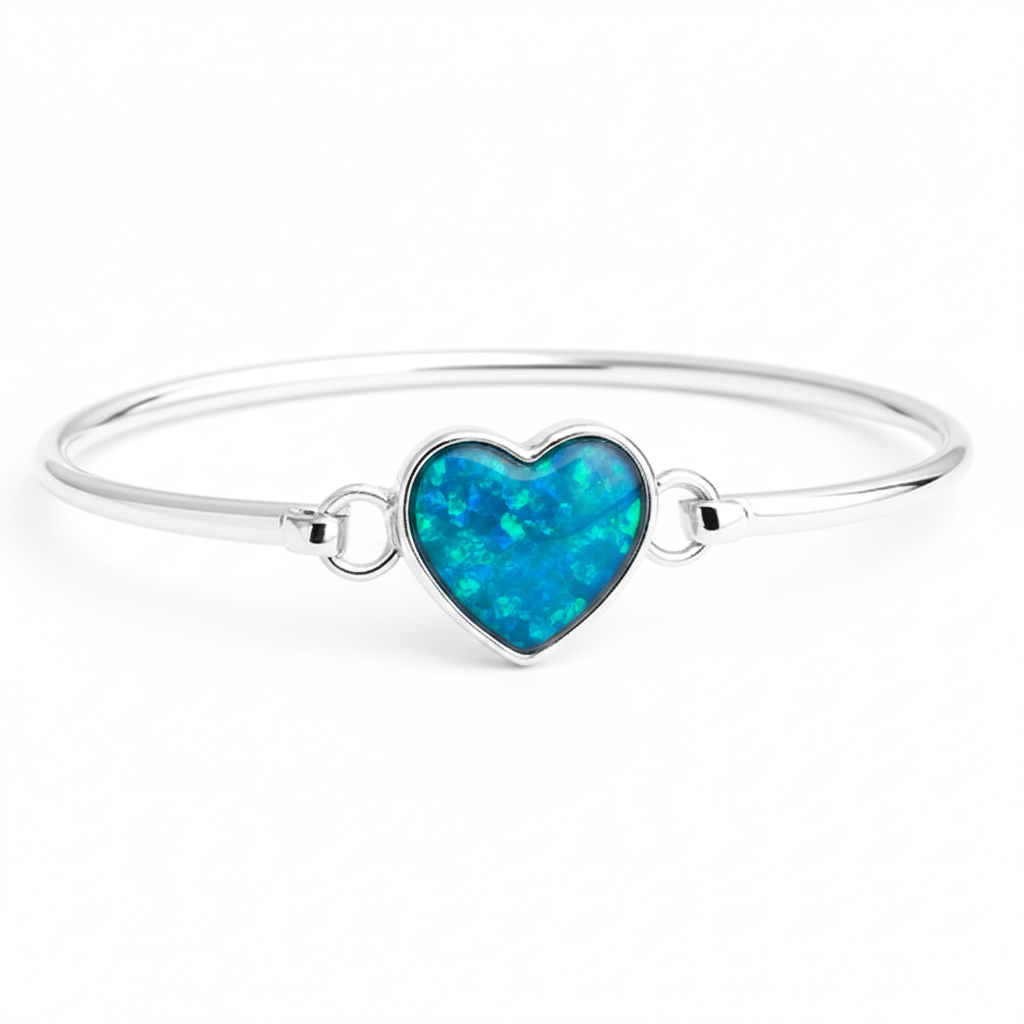 Heart hook clasp silver bangle with blue teal opal resin in heart bezel, white background