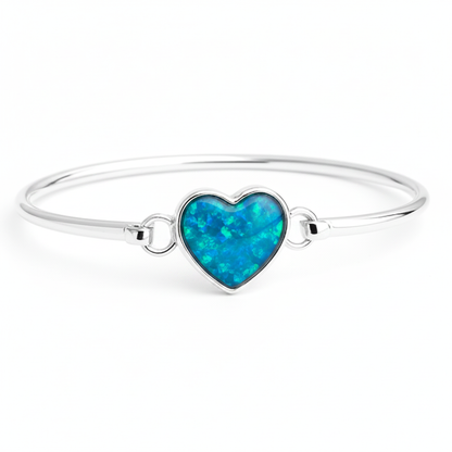 Heart hook clasp silver bangle with blue teal opal resin in heart bezel, white background