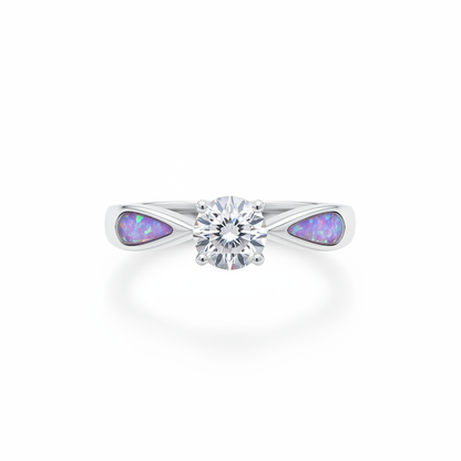Solitaire CZ 925 silver ring with lavender purple opal resin in teardrop shoulder settings on white background