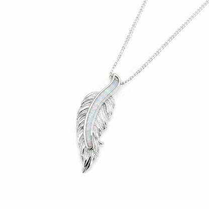 Floating feather silver pendant with white pearl opal resin spine channel, white background
