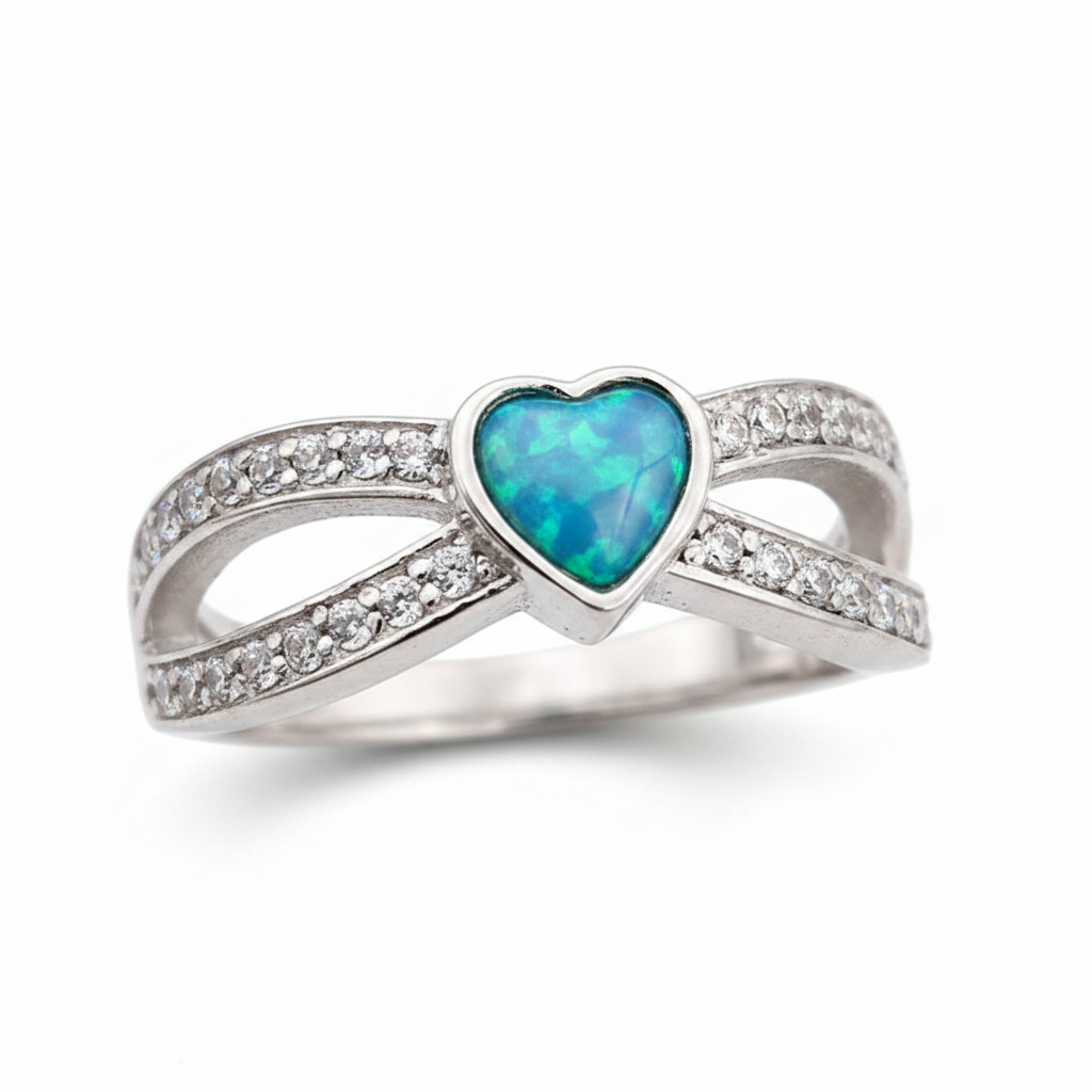Split heart CZ 925 silver ring with blue teal opal resin angled 3/4 view on white background