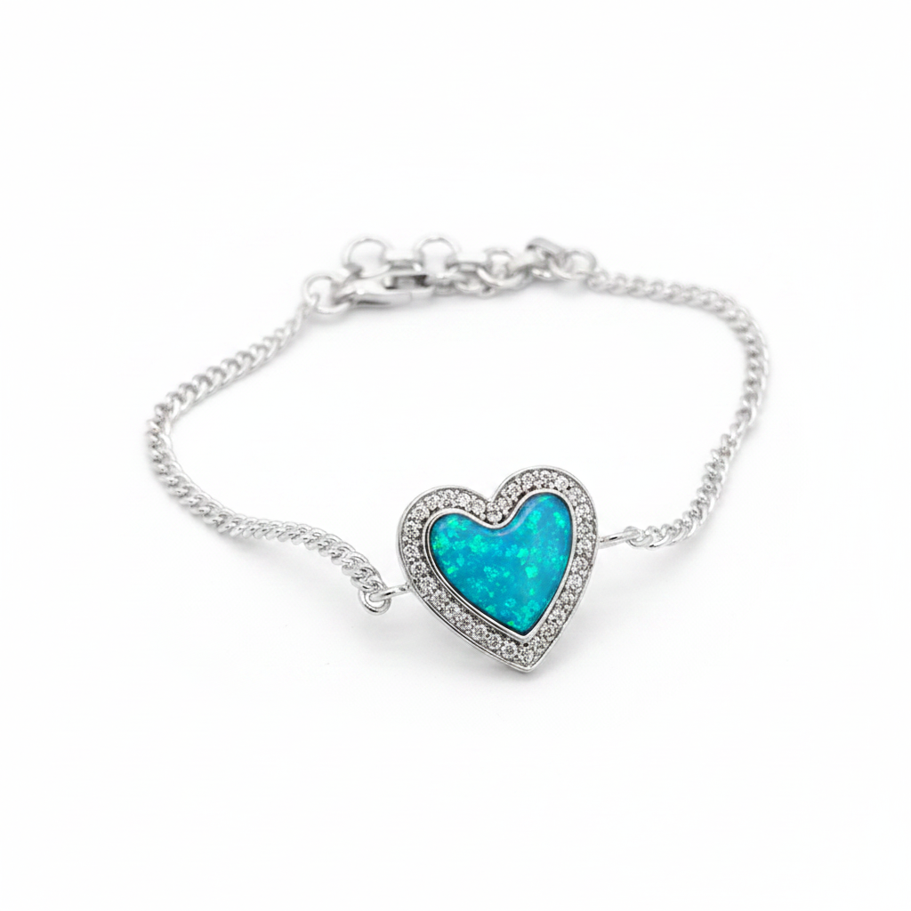 Heart CZ silver curb chain bracelet with blue teal opal resin in CZ halo heart bezel, white background