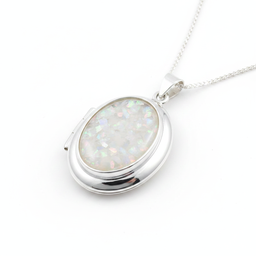 Silver 925 oval hinged locket with white pearl opal resin in 18x13mm setting on white background