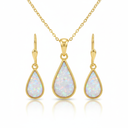 9ct gold teardrop memorial jewellery set with white pearl iridescent opal flakes – full set flat-lay white background