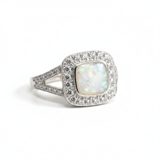925 sterling silver split shank cushion memorial ring with white pearl opal flakes in cushion bezel on white background