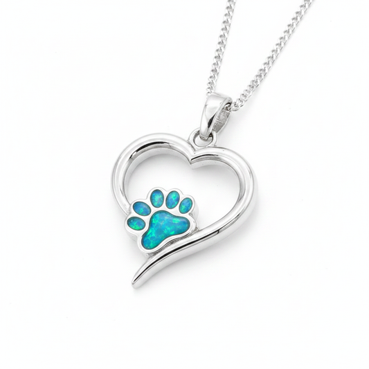 Pawprint hollow heart silver pendant with blue teal opal resin in paw print, white background