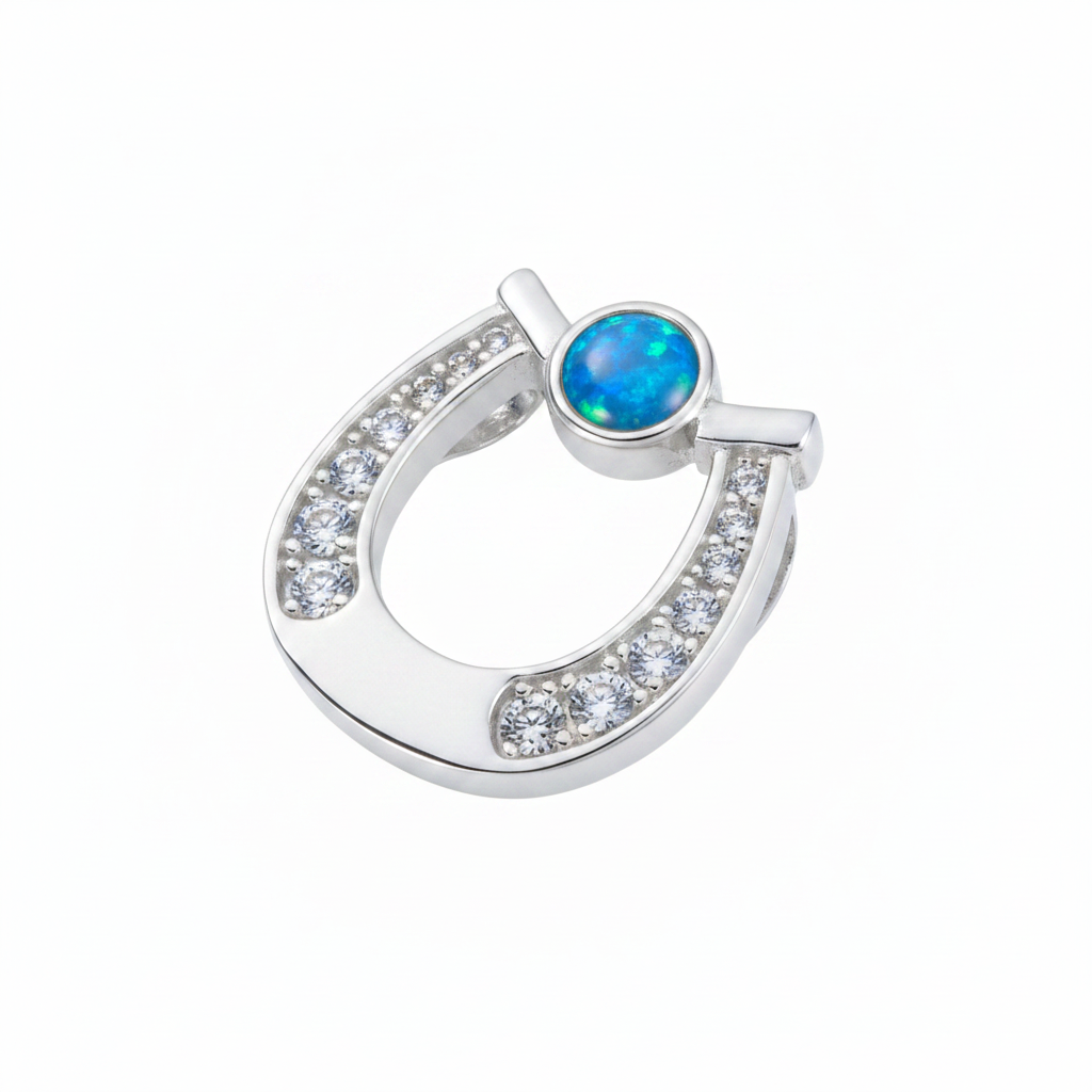 Silver 925 CZ horseshoe memorial pendant with blue opal flakes, white background