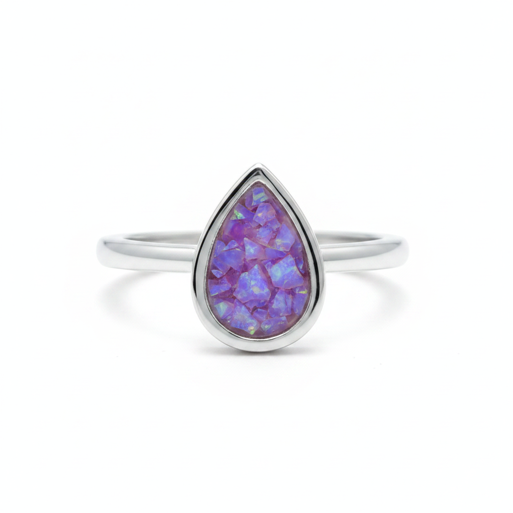 925 sterling silver pear cut bezel cathedral memorial ring with lavender purple opal flakes in flat resin setting on white background