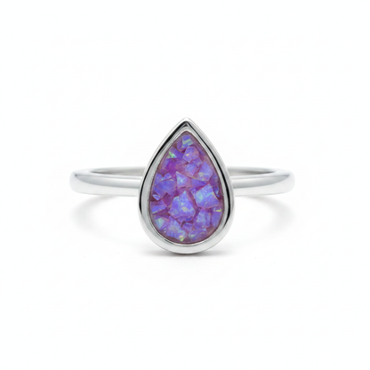 925 sterling silver pear cut bezel cathedral memorial ring with lavender purple opal flakes in flat resin setting on white background