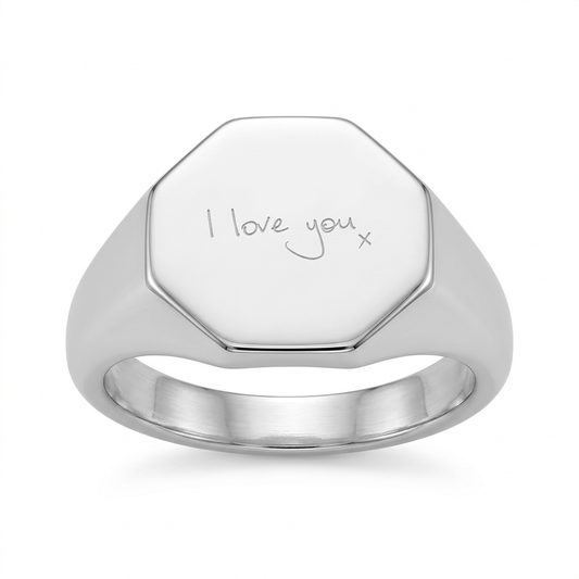 Illustrative front view of engraved 12mm octagon silver signet ring