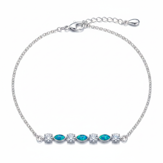 925 sterling silver CZ marquise memorial bracelet with blue teal opal resin in marquise bezels on white background