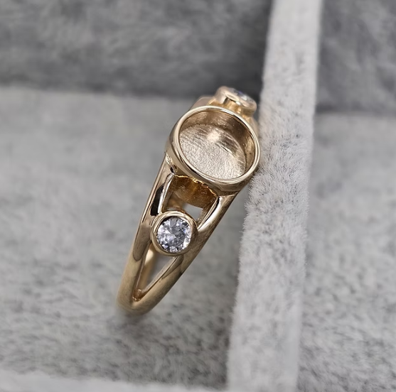 9ct yellow gold double split shank ring side view showing open gallery and CZ bezel stones