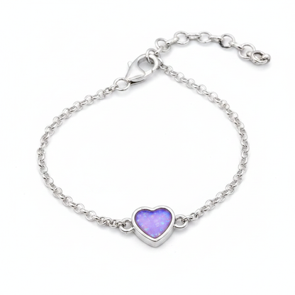 Mini heart charm silver bracelet with lavender purple opal resin in heart bezel, white background