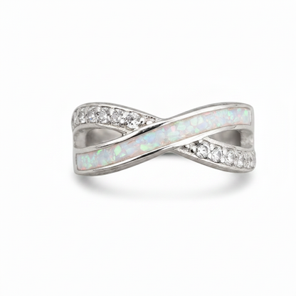 Infinity wave CZ 925 silver ring with white pearl opal resin in central channel on white background