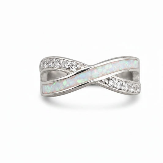 Infinity wave CZ 925 silver ring with white pearl opal resin in central channel on white background