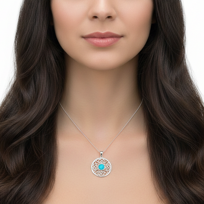 Model wearing silver 925 round Celtic knotwork memorial pendant at true 28mm scale