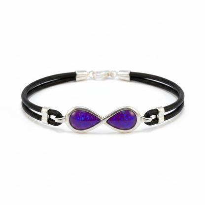 Silver 925 infinity memorial bracelet — lavender purple opal flakes resin in both infinity loop settings on black leather cord