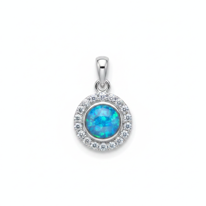 Silver 925 round halo CZ memorial pendant with blue opal flakes, white background