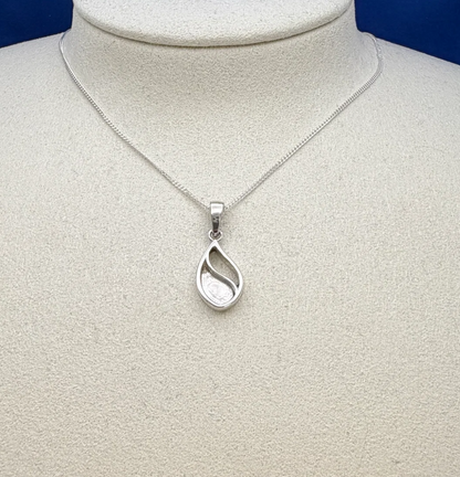 925 sterling silver flowing open teardrop pendant necklace on display showing contemporary teardrop outline with sweeping S-curve divider on fine curb chain