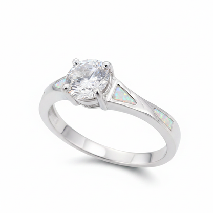 Twisted channel solitaire 925 silver ring with white pearl opal resin in triangular shoulder channels on white background