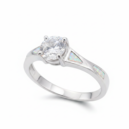 Twisted channel solitaire 925 silver ring with white pearl opal resin in triangular shoulder channels on white background