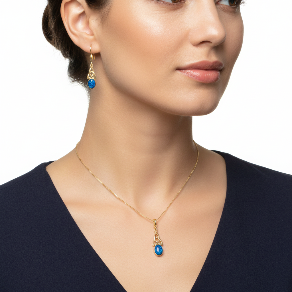 Model wearing complete 9ct gold Celtic memorial jewellery set – pendant 10x8mm and earrings 7x5mm at true dainty scale