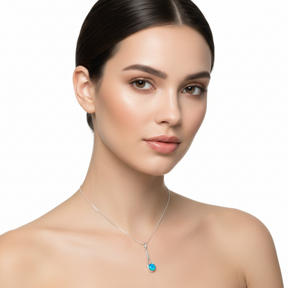 Model wearing silver 925 wishbone drop memorial pendant at true 31x9mm scale