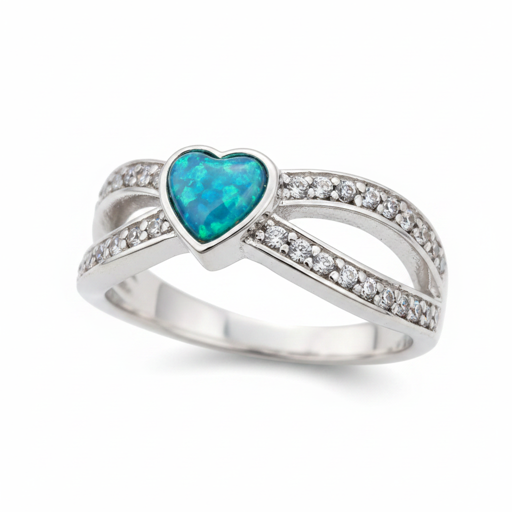 Split heart CZ 925 silver ring with blue teal opal resin close-up side view on white background